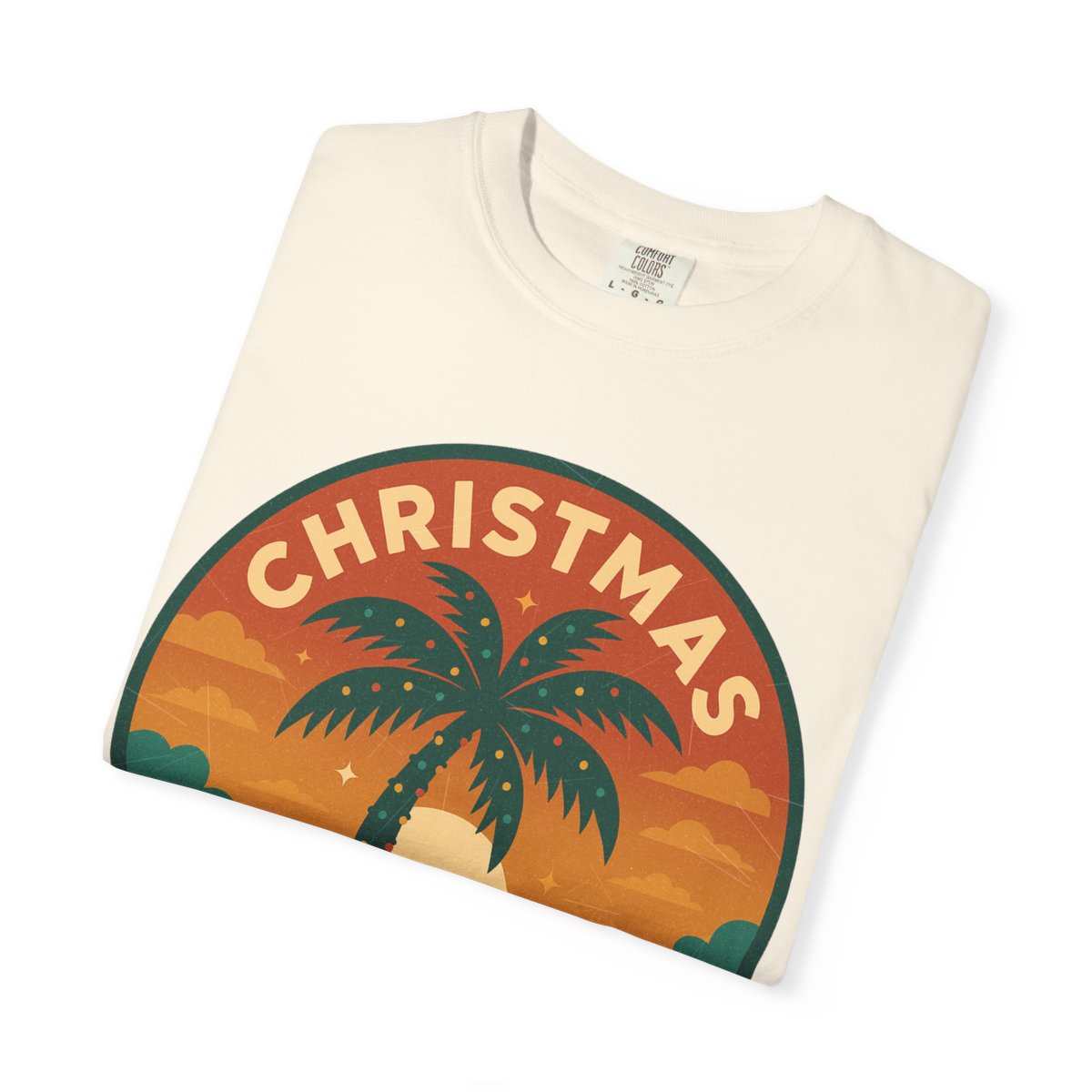 Christmas, FL — Festive Badge Sunrise T-shirt – Ivory folded